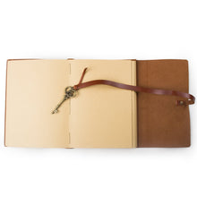 Load image into Gallery viewer, Shop unique genuine leather handmade diary journal travel notebook sketchbook with strap bind and key style buckle stitched by hand with craft paper red brown a5 blank craft paper