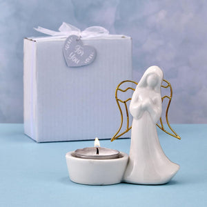 Ceramic Angel candle holder with gold metal  wings from fashioncraft