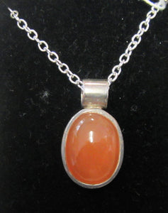 Beautiful handcrafted silver plated necklace with oval bezel carnelian