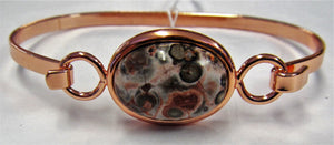 Beautiful handcrafted copper bangle with fossil