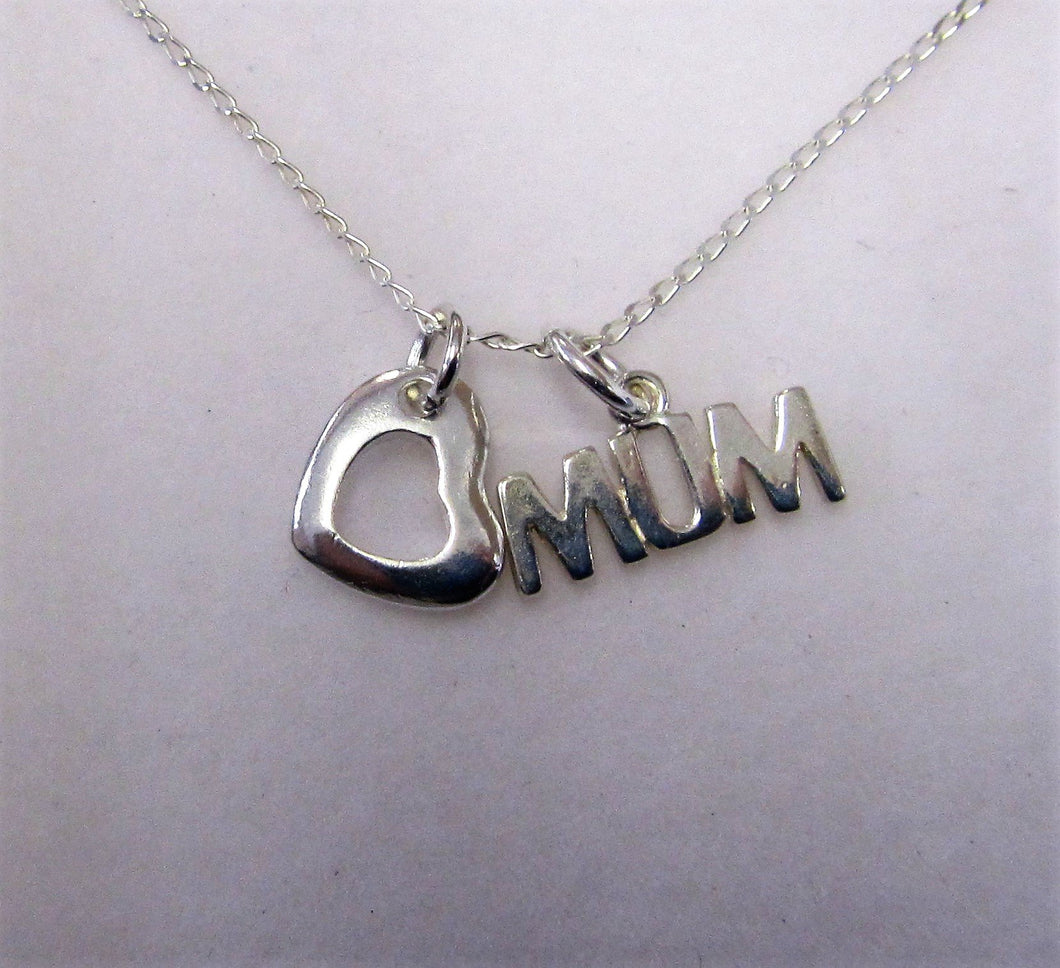 Beautiful handcrafted sterling silver necklace with Mum and heart charm