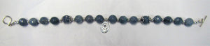 Beautiful handcrafted sterling silver bracelet with grey quartz and mother and child charm