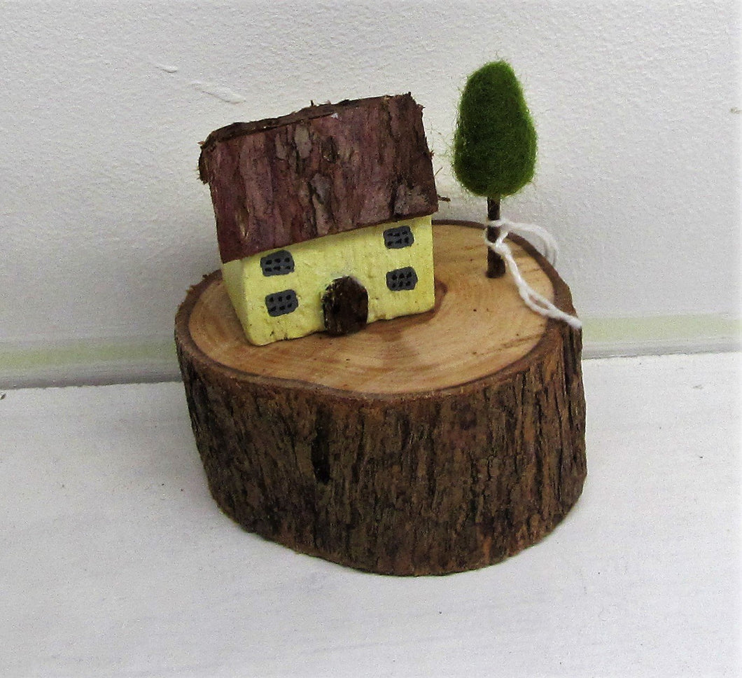 Beautiful handcrafted wooden log houses in various colours