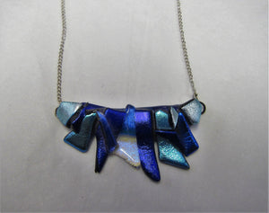 Beautiful handcrafted dichroic glass pendant on a sterling silver necklace