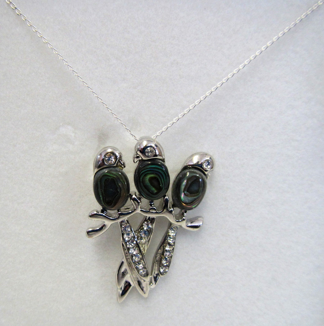 Beautiful handcrafted sterling silver necklace with abalone birds on a branch pendant