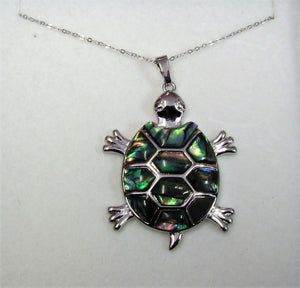 Beautiful handcrafted sterling silver necklace with abalone turtle pendant