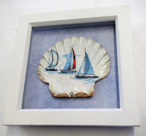 Beautiful handcrafted scallop shell boat picture