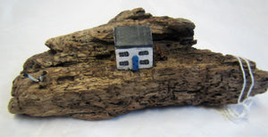 Beautiful handcrafted wooden "cottage on driftwood