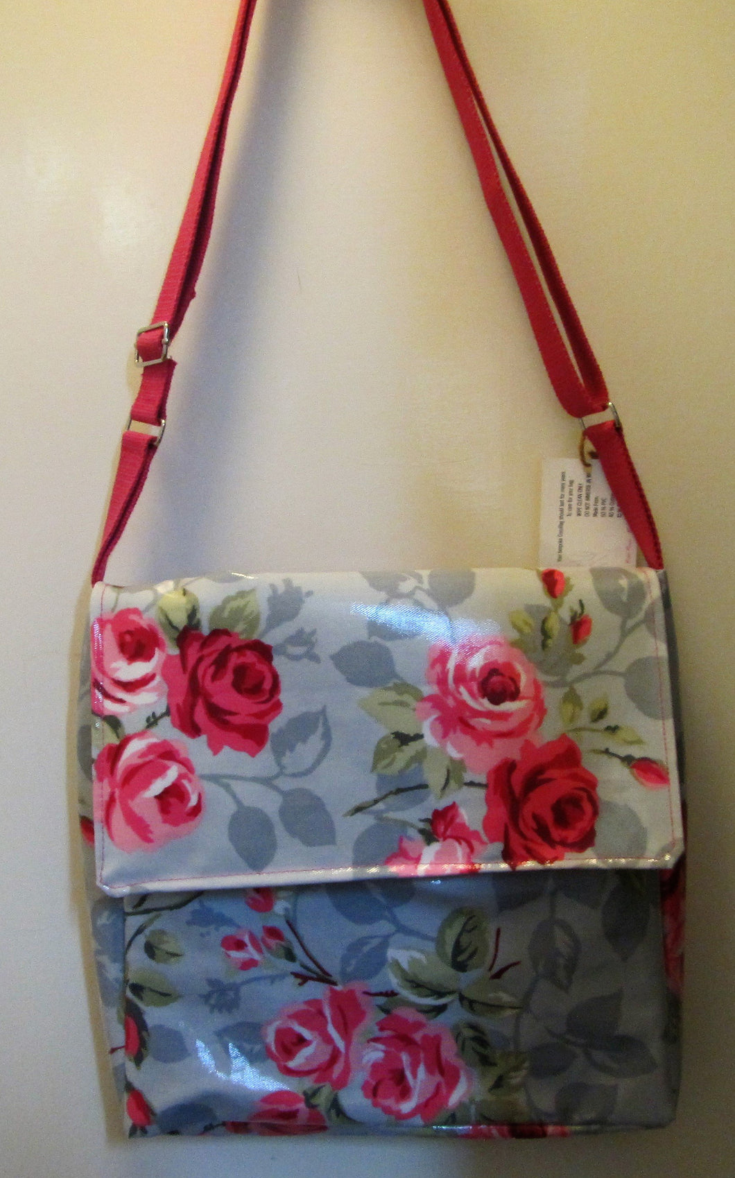 Beautiful handcrafted grey wax fabric with pink roses messenger bag