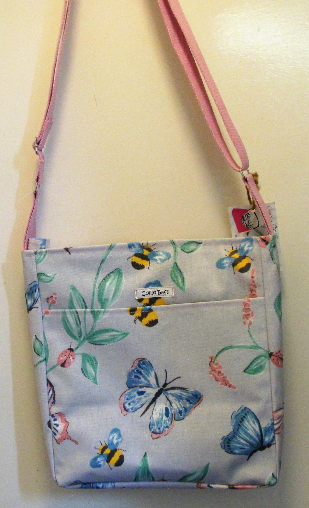 Beautiful handcrafted wax fabric butterfly, bee and ladybird messenger bag