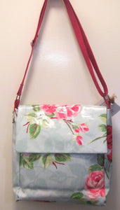 Beautiful handcrafted blue and pink floral wax fabric messenger bag