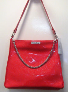 Beautiful handcrafted red sparkle patent handbag with sliver chain handle