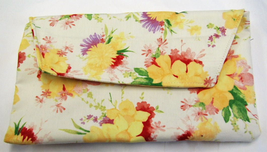 Beautiful handcrafted cream floral clutch bag