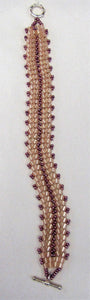 Beautiful handcrafted bracelet with pink beads, fastened  with a toggle clasp