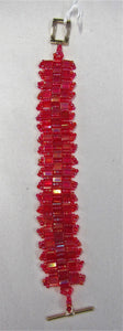 Beautiful handcrafted bracelet with red beads, fastened with a magnetic clasp
