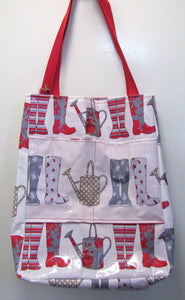 Beautiful handcrafted wellie themed wax fabric wellie bag with two handles